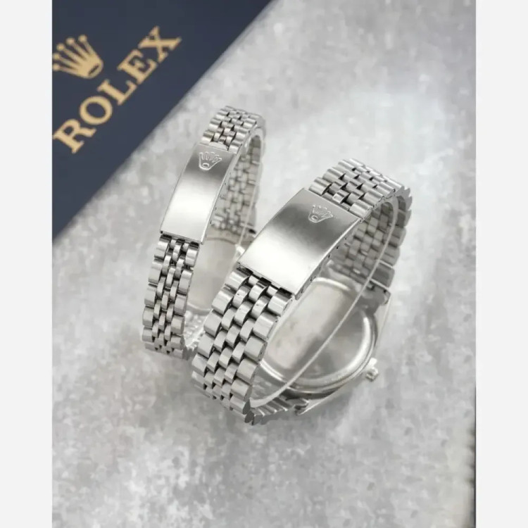 ساعت مچی رولکس مدل بند استیل نقره ای صفحه نقره ای تک موتوره با تقویم تلسکوپی